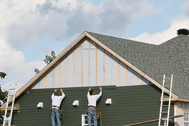 Professional Siding Replacement technician working in Wattsburg, PA